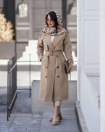 ترنج کت بارونی زنانه کرم کمربنددار بلند مناسب استایل شیک پاییزی و زمستانی